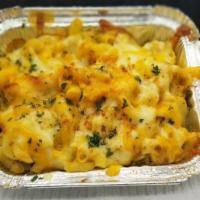 Shrimp Mac · This decadent mac and cheese is made with 7 different cheeses richly seasoned and peppered w...