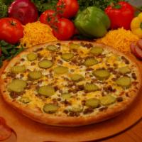 Cheeseburger Pizza · Beef, onions, pickles, mustard, mozzarella and cheddar.
