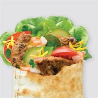 Black Bean Patty Pita, Vegan and Vegetarian options available · Options to build your own pita or go with our suggested build.

Black bean patty grilled wit...