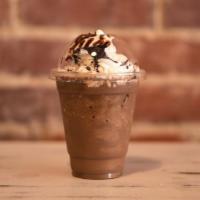 Mocha Frappe · Coffee base with mocha sauce, milk and ice blended and topped with whipped cream and chocola...