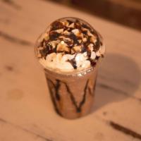 Turtle Mocha Frappe · Coffee base, caramel, mocha sauce, milk and ice blended and topped with whipped cream.