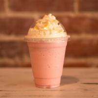 Unicorn Frappe · Vanilla base, strawberry syrup, milk and ice. Blended with edible glitter. Topped with whipp...