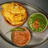 Chips and Salsa · House Made Corn Tortilla, Rojo and Verde Salsa.