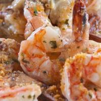 Shrimp Scampi Over Linguini · Lemon, white wine, garlic, and seasoned breadcrumbs.