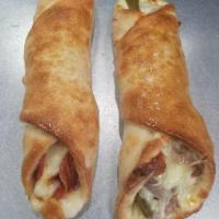Chicken Roll · Pizza dough rolled with chicken, cheese and tomato sauce.
