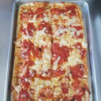 Grandma Pie · Thin square pan pizza with our delicious marinara sauce and fresh mozzarella with herbs and ...