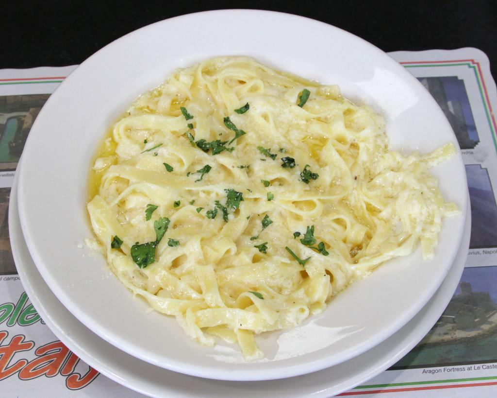 Fettuccine Alfredo · Egg noodles in a rich creamy Alfredo sauce.