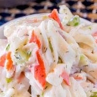 Seafood Salad · Salad with a seasoned mixed seafood base that is occasionally dressed with mayonnaise. 