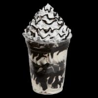 Oreo® Cookie Sundae Dasher® · Layers of Oreo® cookies, vanilla ice cream, and fudge topped with whipped cream and fudge dr...
