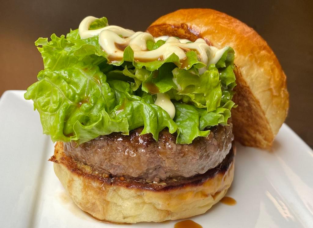 Teriyaki Burger · 6 oz. of 50/50 Japanese A5 Wagyu beef and grass-fed Angus beef, with house-made Wagyu teriyaki sauce, green leaf lettuce and kewpie mayo. Served with pickles and fries on the side.