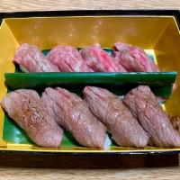 Japanese A5 Wagyu Sushi · 8 pc of Japanese A5 Wagyu Rib eye Nigiri Sushi 
4 pc Raw and 4pc Torched 
Comes with a Cup o...