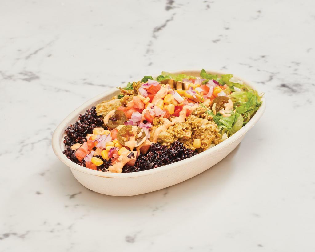 Power Bowl · Includes 50% extra serve of your choice filling, black rice and choice of beans. Toppings include romaine lettuce, tomato salsa, cilantro red onion salsa, corn salsa and sauce choice. Vegetarian option (excluding three bean mix) includes double serve of guacamole.