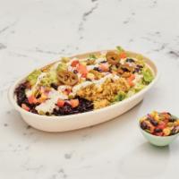 IQ Bowl · Your choice of filling, black rice and beans. Toppings include romaine lettuce, pepita salsa...