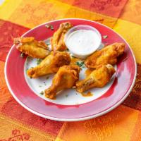6 Hot Wings  · Cooked wing of a chicken coated in sauce or seasoning.