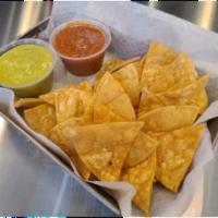 Chips & Salsa · House made chips & our House Green & Red Salsas (Vegan)
