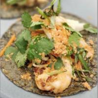 Coconut Basil Shrimp Taco · Marinated grilled shrimp, jicama mix, basil, cilantro, & toasted coconut. (Gluten-Free)