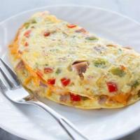  Western Omelette Platter · An omelette served with scrambled eggs, ham, bell peppers and onions.
