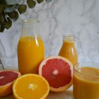 Vitamin C Booster Juice · Lemon, orange, grapefruit, pineapple and ginger.