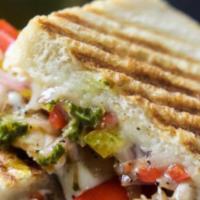Chicken Fajita Panini · Grilled chicken, cheddar cheese, roasted peppers, caramelized onions and salsa. Grilled on E...