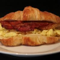 Bacon, Eggs and Cheese Croissant · Two scrambled eggs, crispy bacon, American cheese on a freshly baked croissant