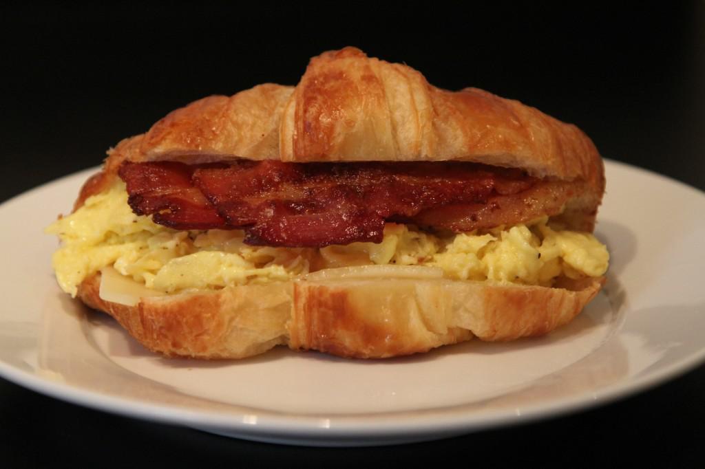 Bacon, Eggs and Cheese Croissant · Two scrambled eggs, crispy bacon, American cheese on a freshly baked croissant