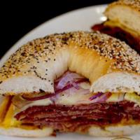 Easy Pastrami and Eggs Bagel · Two eggs, Premium Pastrami and Swiss Cheese on a Choice of Bagel