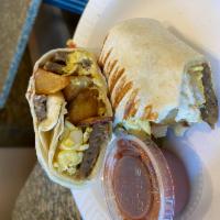 Southwest Breakfast Burrito  · Scrambled eggs, Sausages, sautéed onions, Peppers, and home fries in toasted wrap.