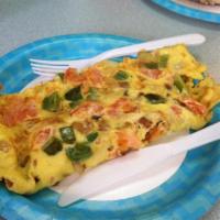 3 Eggs Omelette · Three eggs omelette and home fries . Get it plain or create your own