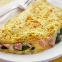 Western Omelette · Ham, cheese, pepper and onions with home fries.