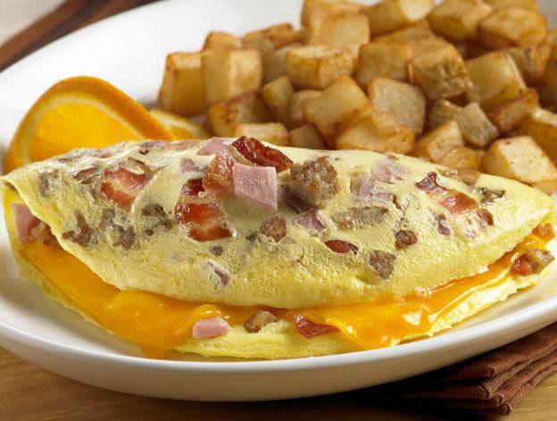 The Meatatarian omelette  (For Meat Lovers) · You don't have to choose, Get it all. Eggs, Cheese, Bacon, Ham, Sausage, and Pork roll omelette with home fries and bagel or toast