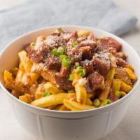 Gaucho Fries · Crispy french fries topped with grilled Brazilian sausage covered in our homemade chipotle m...