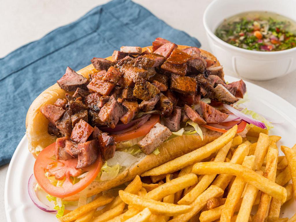 Meatlovers Sandwich · fresh French bread, light mayo and mustard, fresh lettuce, tomato and red onions covered with the 3 meats top sirloin - Brazilian sausage - pork sirloin topped with homemade chimichurri sauce with a side of fries.