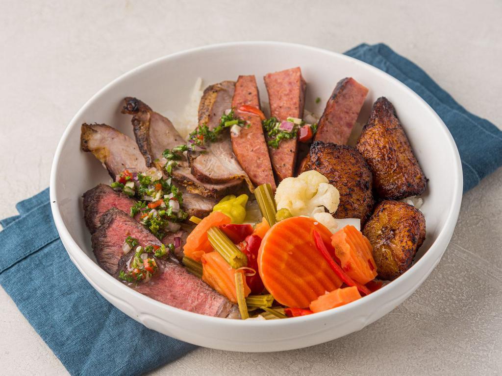 Meatlovers bowl · Top sirloin, Brazilian sausage, and pork sirloin served over rice, vinaigrette veggies and fried plantain.
