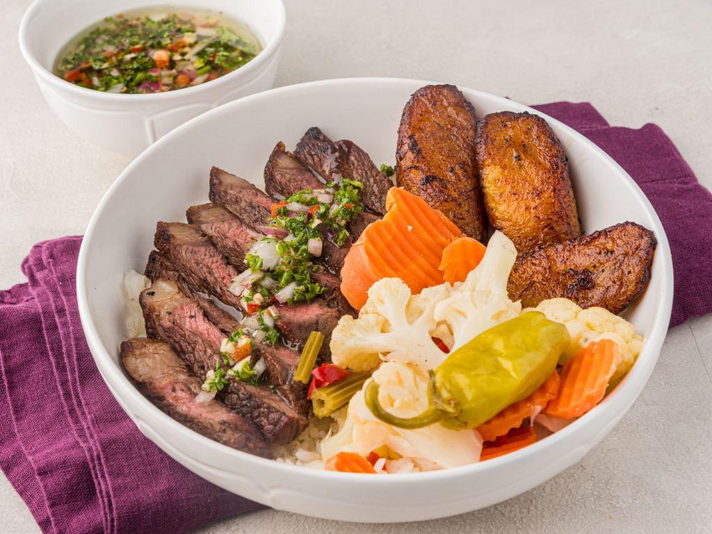 Picanha bowl · Grilled top sirloin with chimichurri sauce served over rice, vinaigrette veggies and fried plantain.