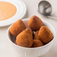 Coxinhas (Chicken Croquettes) · The most popular appetizer in Brazil made with potatoes, flour and filled with chicken (8 pi...