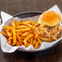 Pulled Chicken Sandwich Combo · Seasoned, smoked and shredded chicken breasts and thighs on a potato roll with your choice o...