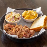 Pulled Pork Platter · 1/2 pound of seasoned, smoked and pulled pork comes with 2 sides and a sauce on the side.