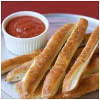 Breadstyxz · Our hand-tossed original crust brushed with garlic butter. Served with choice of dipping sau...