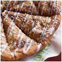 Cinnamonstyxz · Deep dish crust topped with cinnamon-butter, powdered sugar and icing.