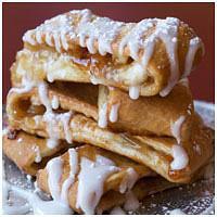 Apple Strudel · Apple and cinnamo and sugar filling folded in our original hand-tossed crust and topped with...