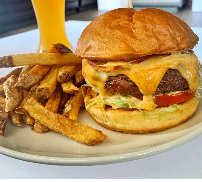 Exit 13 Burger  · 8 oz. burger served with lettuce, tomato, red onion on a buttery bun, served with hand-cut french fries, our special sauce & your choice of cheese