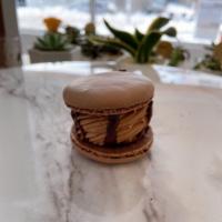 Chocolate Macarons · Chocolate shell with chocolate cream.