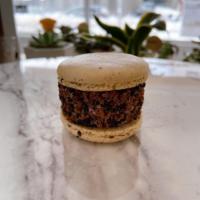 Cookies N Cream Macarons · Cookie shell with Oreo cream.