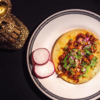 Taco de chorizo · Home made chorizo, cilantro and onion