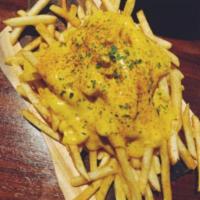 Crispy French Fries with Cheddar Cheese Sauce · 