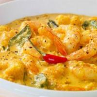 10. Goan Shrimp Curry · Cooked with fresh coconut milk with sauce. Served with basmati rice.