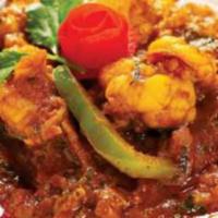 6. Shrimp Madras · Shrimp cooked with potato and hot spices. Served with basmati rice.
