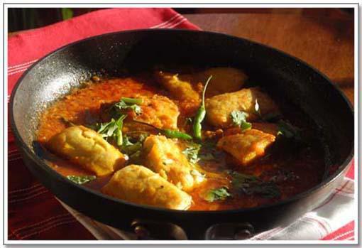1. Tilapia Fish Curry · Cooked with curry sauce. Served with basmati rice.