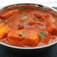 19. Paneer Makhni · Homemade cheese with cream and tomato sauce. Served with basmati rice.