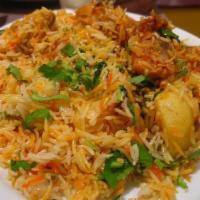 5. Vegetable Biryani · Mixed vegetables and mild spices cooked with basmati rice.